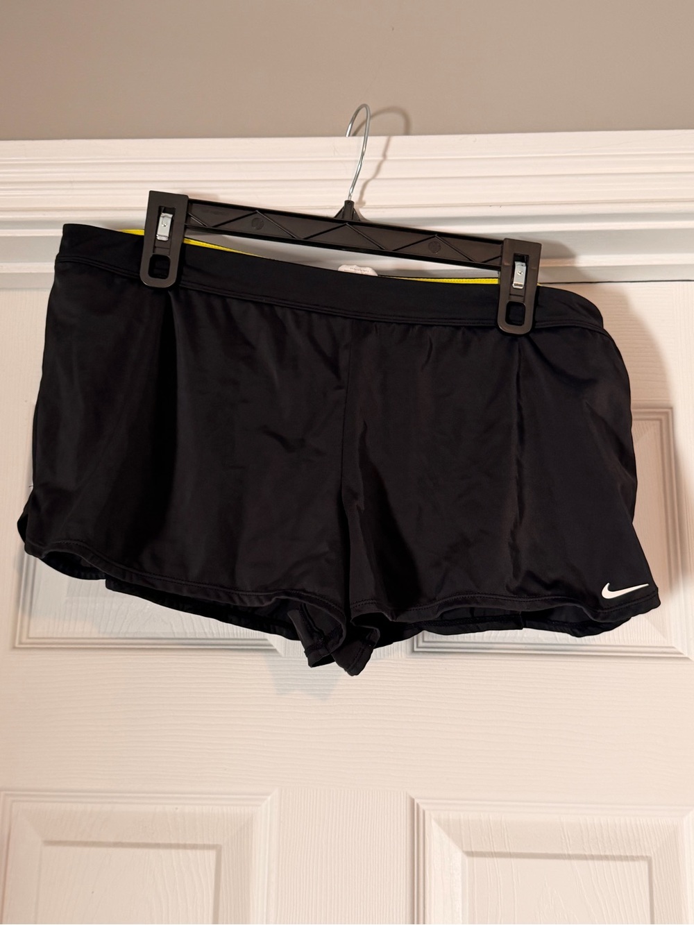 Nike Black Women's Athletic Shorts with Yellow Waistband Accent